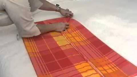 Aprenda a dobrar um lençol com elástico